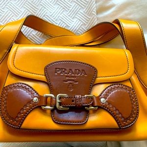 Prada-Brand new without tags. Vintage leather with hand-stamped embellishments.